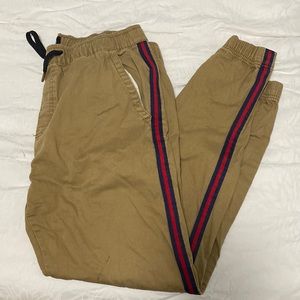 Khaki joggers with red/navy stripes